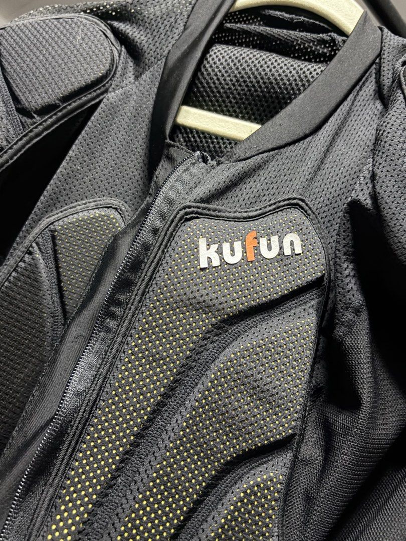 Kufun Motorcycle Body Armor Jacket Protective Gear (Category: Coats, Jackets and Outerwear) located in Manila. Submitted by finderskeepersmnl_092026 (Listing ID 1464745548, Image 2). Description: Kufun protective motorcycle armor jacket. Heavy-duty padding on shoulders, chest, and back. Black mesh fabric keeps airflow steady during rides. Sturdy zipper down the front. Orange snowflake logo printed on the back panel. Multiple articulated pads abso