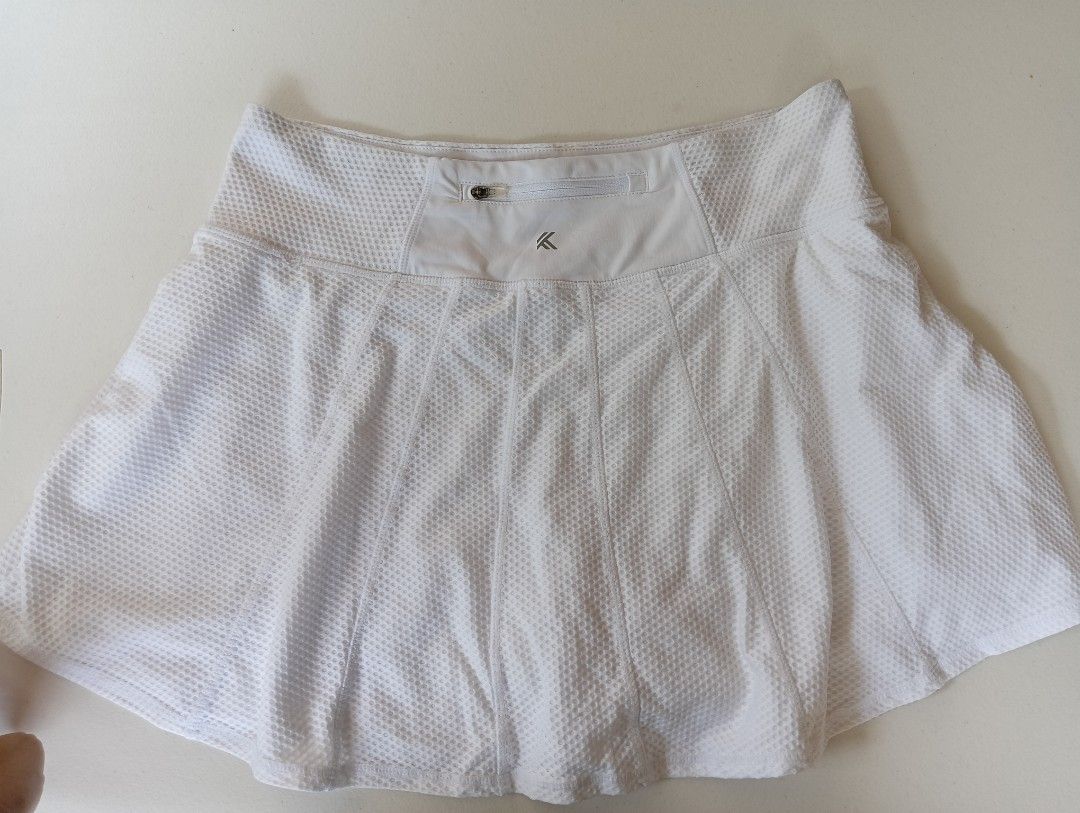Kyodan Tennis Skirts (Category: Activewear) located in Rizal. Submitted by timeless_shop (Listing ID 1464604702, Image 2). Description: 🔥 ORIGINAL Kyodan Tennis Skirt - White Mesh Pleated - Size MEDIUM ✨ 📏 Length: 14 inches - mini pleated, ang cute! 📏 Width Waistline 16 inches Size Fit : 32-33 High Waist, garterized! 👗 Size: MEDIUM Tag 🎨 Color: White - puting-puti, malinis tingnan! ✂️ Style: Pleated Tennis Skirt with inner shorts 💯 Conditio