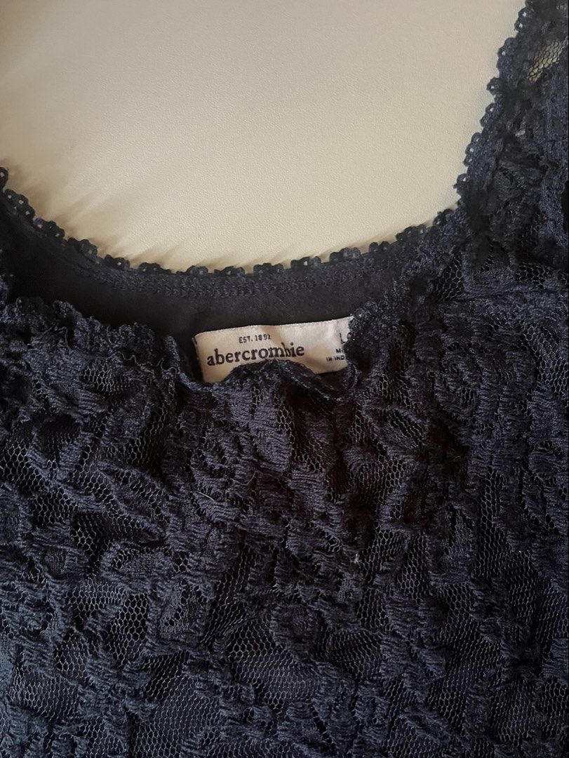 lace y2k top 💕 (Category: Sleeveless) located in Dagupan City. Submitted by whimsyluns (Listing ID 1464591525, Image 2). Description: baby doll lace top 💞 size: L on tag but good for s-m dark navy blue not black soft material/ good lace details.