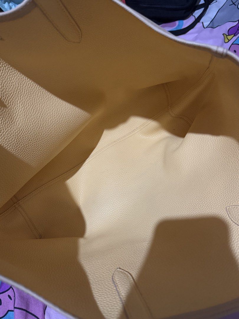 Lacoste Croissant Cornsilk Shopping Bag (Category: Tote Bags) located in Manila. Submitted by medv27 (Listing ID 1464601763, Image 3). Description: - Authentic Lacoste tote bag - Color: Light beige / Corn silk - Material: Polyvinyl Chloride (PVC) - Includes a detachable inner pouch - Ideal for shopping and everyday use - Original tags still attached.