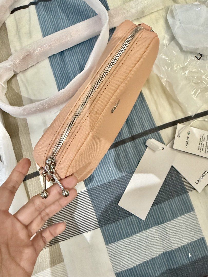 Lacoste Daily City Messenger Bag (Category: Cross-body Bags) located in Rizal. Submitted by caintarizal2024 (Listing ID 1464677712, Image 2). Description: Lacoste Sling Bag Naging display lang sa cabinet hindi pa nagagamit. Pwede ko isama ang paper bag ng Lacoste Last Price posted.