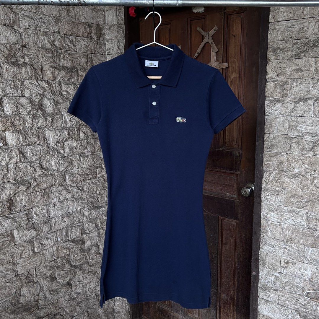 Lacoste Navy Polo Dress (Category: Dresses) located in Dipolog. Submitted by edthrfts (Listing ID 1464705826, Image 1). Description: ✅ ALREADY WASHED AND SANITIZED 📐Width: 15.5 📐Length: 32 Fit to: XS-S Condition: 9.5/10 Color: 9.2/10 Issue: minimal fold line (unnoticeable).