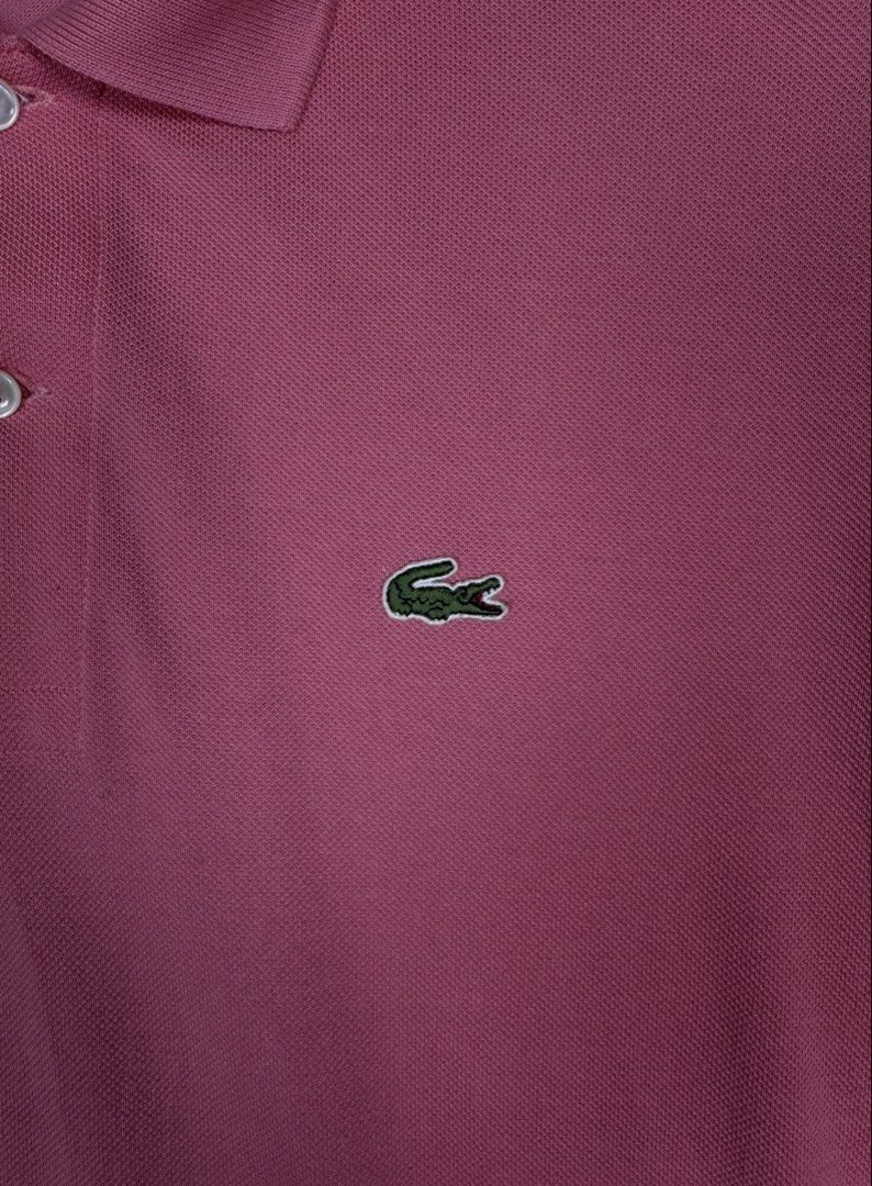 Lacoste Pink Polo Shirt Size 4 (Category: Activewear) located in Zamboanga. Submitted by nurhosinna77344 (Listing ID 1464584795, Image 2). Description: - Classic pink Lacoste polo shirt - Iconic crocodile logo on chest - Made in Peru - 100% cotton material - Size 4 - Small mark on front (please check last photo for details).