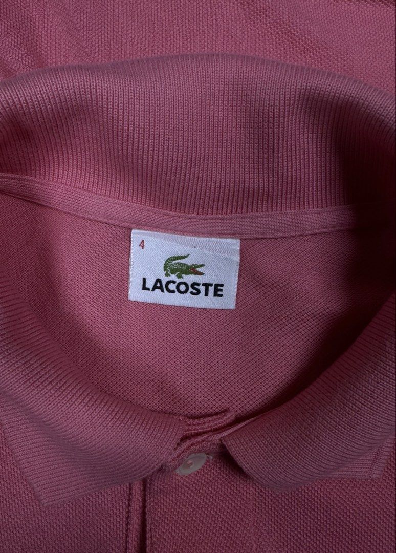 Lacoste Pink Polo Shirt Size 4 (Category: Activewear) located in Zamboanga. Submitted by nurhosinna77344 (Listing ID 1464584795, Image 3). Description: - Classic pink Lacoste polo shirt - Iconic crocodile logo on chest - Made in Peru - 100% cotton material - Size 4 - Small mark on front (please check last photo for details).