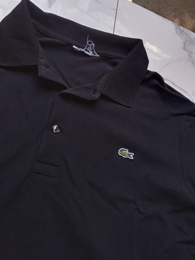 LACOSTE POLO NAVY BLUE (Category: Tshirts & Polo Shirts ) located in Iloilo. Submitted by raydelcanomay (Listing ID 1464621622, Image 2). Description: LACOSTE POLO NAVY BLUE Size - - Dimes - W21 L26 Colorate - 9.7 Condition - excellent Tags - cut neck tag but have washtag Issue - none Price - 750!!.