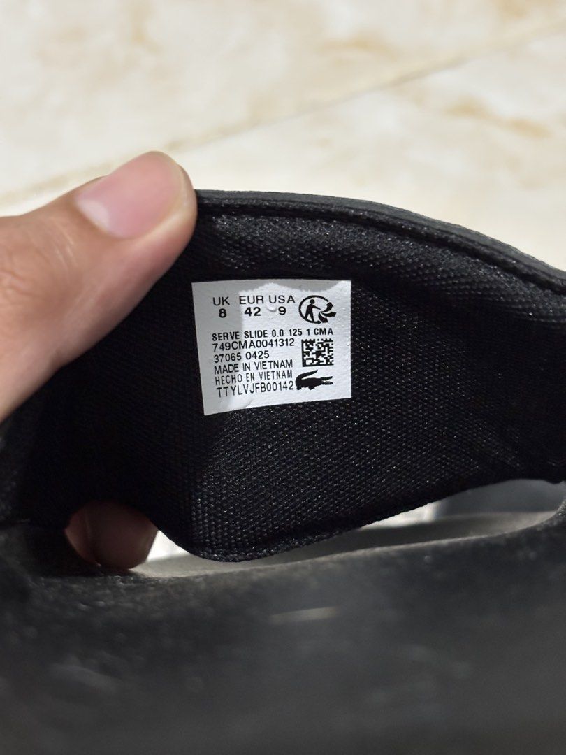 Lacoste Serve Slide Black (Category: Sneakers & Footwear) located in Sogod. Submitted by gahriel_12 (Listing ID 1464754730, Image 2). Description: Condition: Brand New Color: Black Complete with original packaging & tags Rfs: not my size 📥Offer if interested .