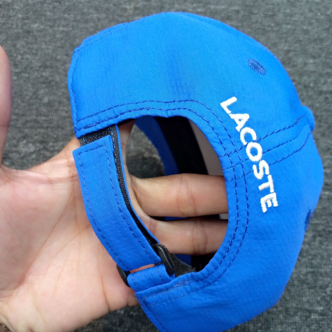 Lacoste Sport Blue Baseball Cap One Size (Category: Caps & Hats) located in Manila. Submitted by pablopresk0. (Listing ID 1464662452, Image 2). Description: - Blue Lacoste Sport cap - Embroidered Lacoste logo on front - Adjustable strap for a comfortable fit - Made from durable polyester - Ideal for everyday wear and sports activities back Manila location📍 Excellent condition✅ Pm if interested📩 .