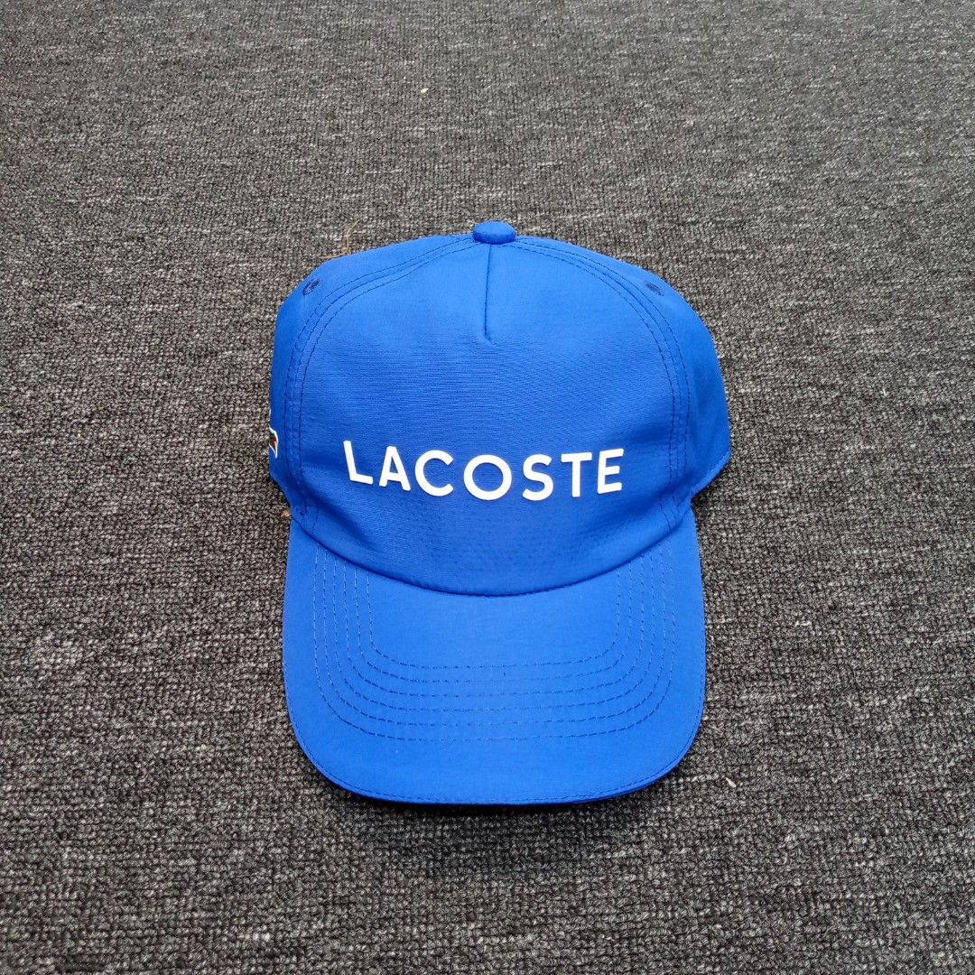 Lacoste Sport Blue Baseball Cap One Size (Category: Caps & Hats) located in Manila. Submitted by pablopresk0. (Listing ID 1464662452, Image 1). Description: - Blue Lacoste Sport cap - Embroidered Lacoste logo on front - Adjustable strap for a comfortable fit - Made from durable polyester - Ideal for everyday wear and sports activities back Manila location📍 Excellent condition✅ Pm if interested📩 .