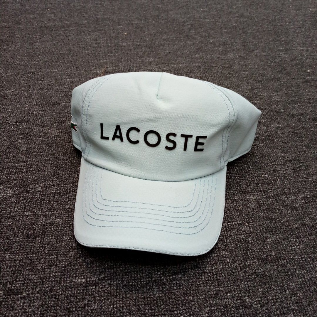 Lacoste Sport Cap Light Blue One Size (Category: Caps & Hats) located in Manila. Submitted by pablopresk0. (Listing ID 1464668021, Image 1). Description: - Light blue Lacoste Sport cap - Adjustable strap at the back - One size fits most - Perfect for casual wear or sports - Clean and ready to wear back Manila location📍 Excellent condition✅ Pm if interested📩 .
