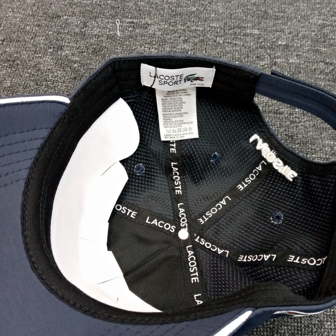 Lacoste Sport Cap Navy Blue One Size (Category: Caps & Hats) located in Manila. Submitted by pablopresk0. (Listing ID 1464668573, Image 3). Description: - Navy blue Lacoste Sport cap - Features iconic crocodile logo on the side - 'LACOSTE' text on front and back - Adjustable strap for a comfortable fit - One size fits most back Manila location📍 Excellent condition✅ Pm if interested📩 .