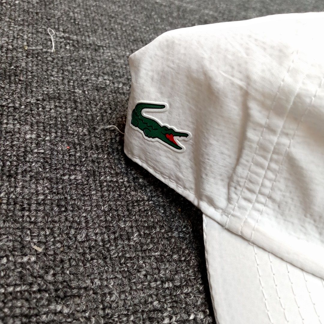 Lacoste Sport White Cap (Category: Caps & Hats) located in Manila. Submitted by pablopresk0. (Listing ID 1464662002, Image 2). Description: - Authentic White Lacoste Sport Cap - Iconic crocodile logo on the side - 'LACOSTE' text on front and back - Adjustable strap for a comfortable fit - One size fits most back Manila location📍 Excellent condition✅ Pm if interested📩 .