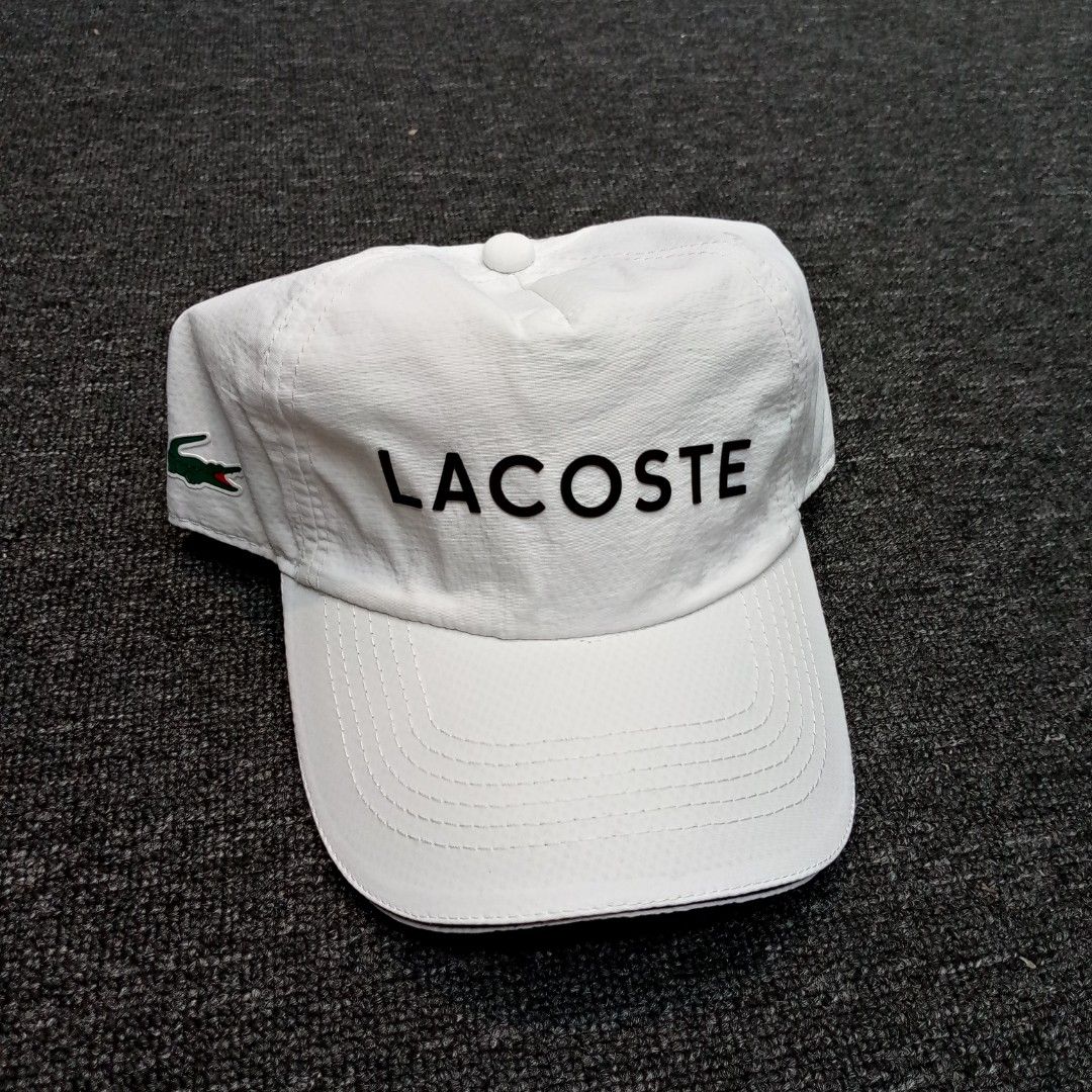 Lacoste Sport White Cap (Category: Caps & Hats) located in Manila. Submitted by pablopresk0. (Listing ID 1464662002, Image 1). Description: - Authentic White Lacoste Sport Cap - Iconic crocodile logo on the side - 'LACOSTE' text on front and back - Adjustable strap for a comfortable fit - One size fits most back Manila location📍 Excellent condition✅ Pm if interested📩 .