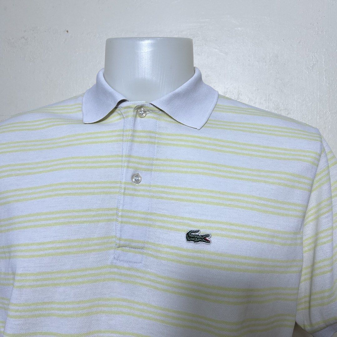 Lacoste Striped Polo Shirt White Yellow (Category: Tshirts & Polo Shirts ) located in Dipolog. Submitted by edthrfts (Listing ID 1464706921, Image 2). Description: ✅ ALREADY WASHED AND SANITIZED 📐Width: 22 📐Length: 28.5 (30 sa likod) Fit to: XL Condition: 9.5/10 Color: 9.5/10 Issue: None.
