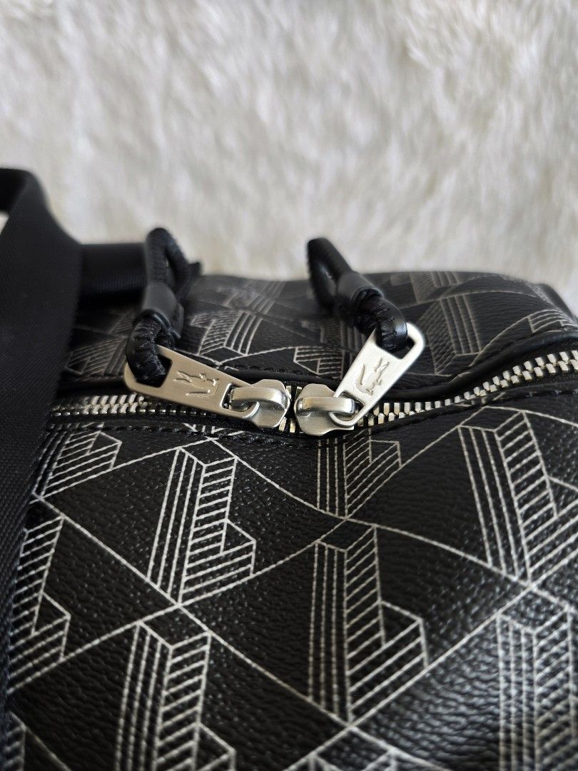 Lacoste The Blend Monogram Duffle Bag (Category: Luxury Bags & Wallets) located in Cebu City. Submitted by cathlinscloset (Listing ID 1464667544, Image 3). Description: Lacoste The Blend Monogram Duffle Bag - Original - All hardwares complete - Used thrice only RFS : declutter Php9,799 ✅ 𝙶𝙲𝚊𝚜𝚑 / 𝙱𝙿𝙸 ❌ 𝙉𝙊 𝙎𝘾𝙊 / 𝙉𝙊 𝙍𝙀𝙎𝙀𝙍𝙑𝘼𝙏𝙄𝙊𝙉 🌹Loc : 𝘾𝙚𝙗𝙪 (Meetup Ayala - Minglanilla Area).