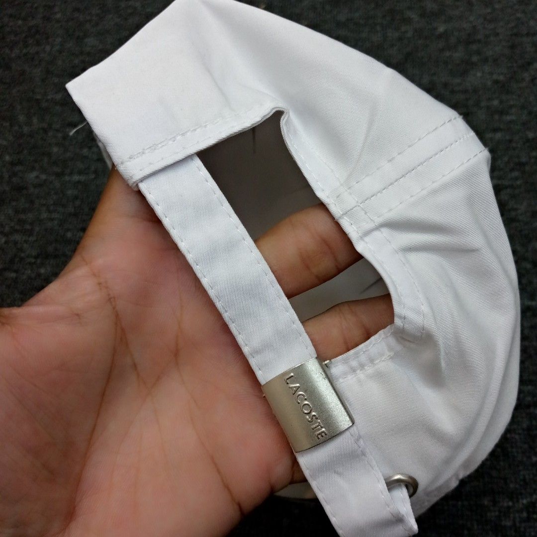 Lacoste White Cap One Size (Category: Caps & Hats) located in Manila. Submitted by pablopresk0. (Listing ID 1464662255, Image 2). Description: - Authentic White Lacoste Cap - Iconic crocodile logo on the front - Adjustable strap with metal buckle at the back - One size fits all - Perfect for everyday wear - Clean and simple design back Manila location📍 Excellent condition✅ Pm if interested📩 .