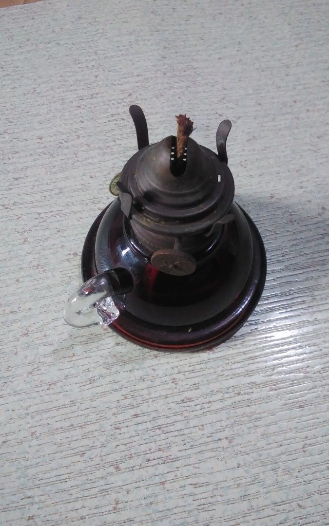 Lamp (Category: Lighting) located in Quezon City. Submitted by Bernz (Listing ID 1464633186, Image 3). Description: Kitaichi kerosene lamp..Kitaichi Glass kerosene lamps have a rich history rooted in the heritage of Otaru, Hokkaido, Japan, where the company was founded in 1901 under its original name, Asahara Glass. [1, 2] Initially, the company grew rapidly by manufacturing functional everyday items: essential oil lamps for home lighting and gla