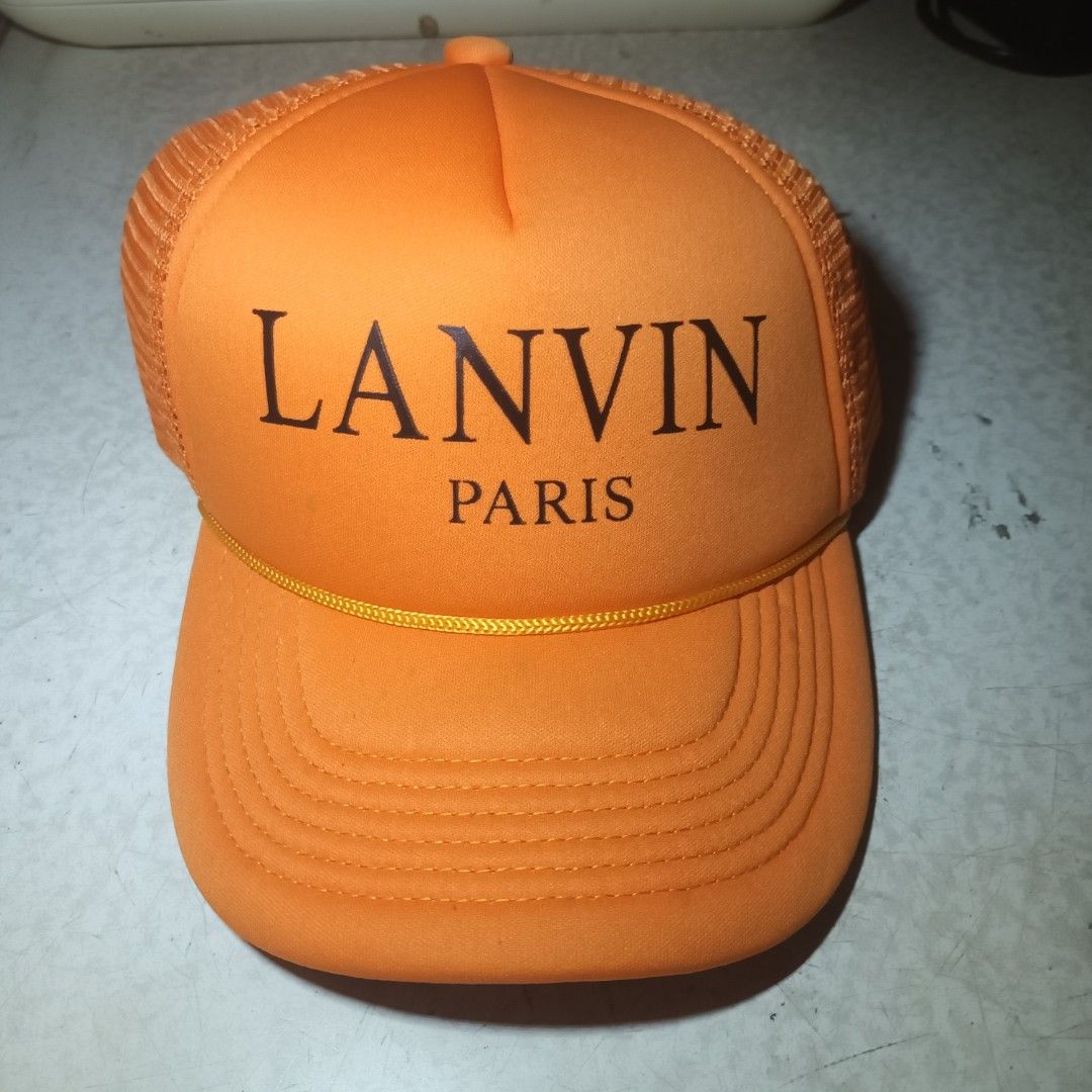 Lanvin Paris Orange Trucker Cap (Category: Caps & Hats) located in Manila. Submitted by itsnik444 (Listing ID 1464585984, Image 1). Description: Mode of Payments: •GCASH Courier: • LALAMOVE ( Same day Delivery) • J&T EXPRESS • LBC ❗️ Product color may slightly vary due to photographic ❗️ DISCLAIMER: We are not associated or affiliated with any brand posted.