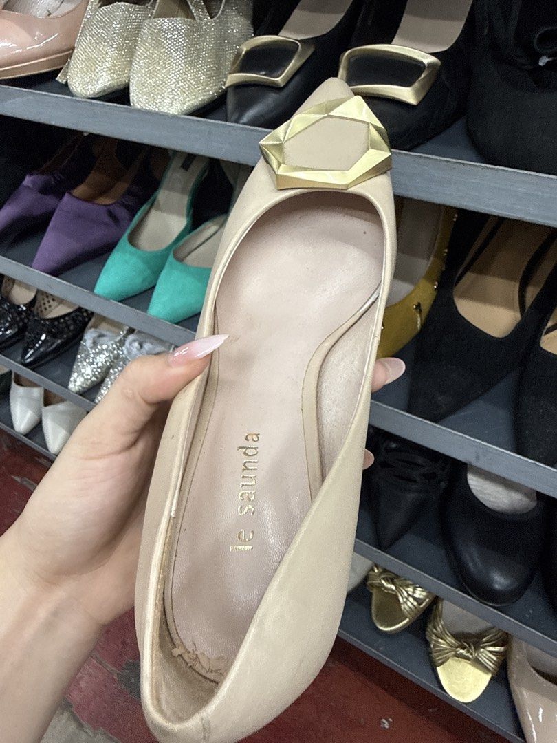 Le Saunda Beige Block Heel Pumps Size 37 (Category: Heels) located in Manila. Submitted by fastlion.584bdf (Listing ID 1464736307, Image 3). Description: - Brand: Le Saunda - Style: Nude beige block heel pumps with pointed toe - Details: Geometric gold buckle and metallic gold trim on the heel - Size: 37 / 235 - Condition: Great for daily office wear or dressing up - DM for inquiries or fast checkout!.