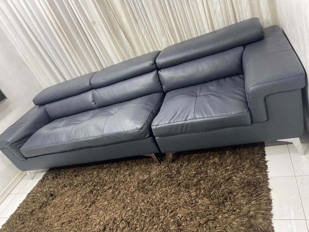 Leather 4-Seater Sofa with Adjustable Headrests (Category: Sofas) located in Antipolo. Submitted by roselle001 (Listing ID 1464646844, Image 3). Description: - 4 seater leather sofa - Adjustable headrests for enhanced comfort - Modern design to complement any living room - Sturdy silver metal legs - Ideal for lounging and entertaining - Pick up only.