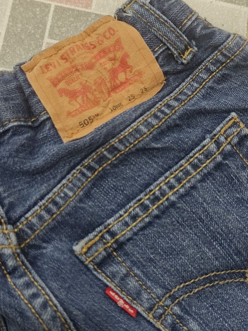 Levi's 505 Jeans W25 L25 (Category: Babies & Kids Fashion) located in Paranaque City. Submitted by zirem (Listing ID 1464624239, Image 3). Description: - Levi's 505 Jeans for Kids - Size: 10 Regular - Waist: 12.5 inches (laid flat) - Length: 33.5 inches - Color: Classic Blue Denim - Origin: Made in Egypt - Features: Adjustable inner waistband - Ideal for: Everyday wear - Condition: Please check photos for details.