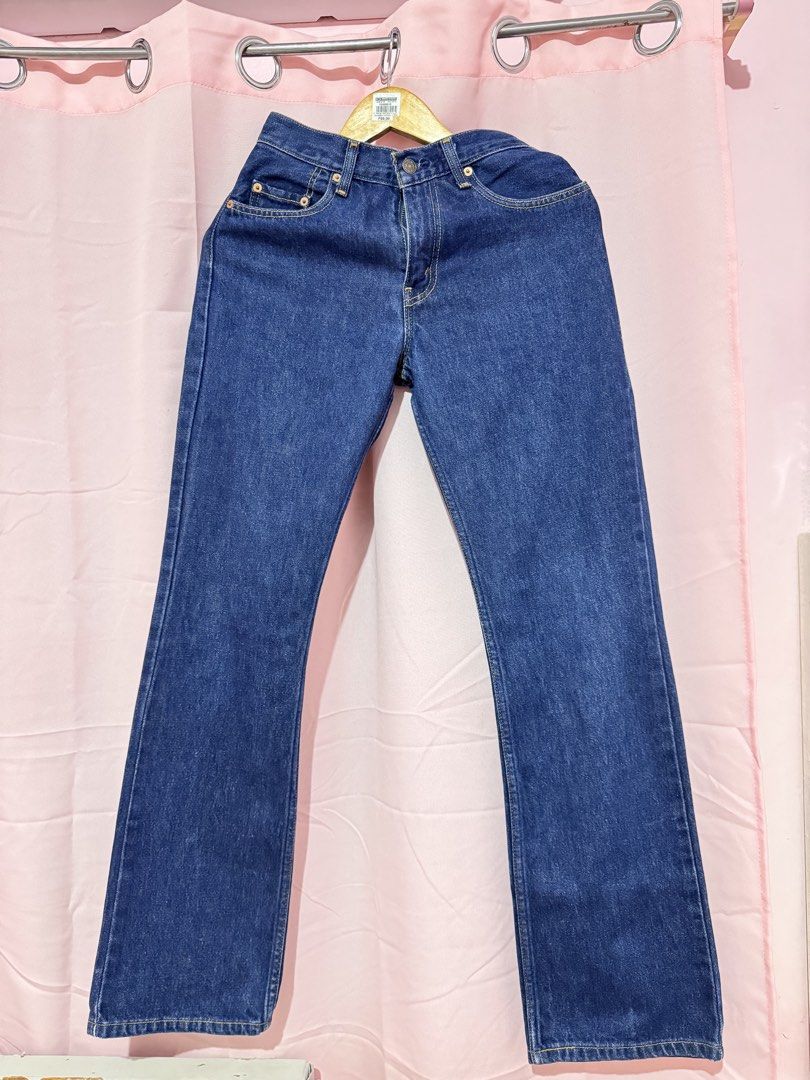 Levi's 596 Dark Wash Jeans (Category: Jeans) located in Bulacan. Submitted by gandarascloset (Listing ID 1464584407, Image 1). Description: - Classic Levi's 596 jeans - Dark wash denim - Iconic red tab and leather patch - Yellow stitching details - Button fly closure - Versatile staple piece.