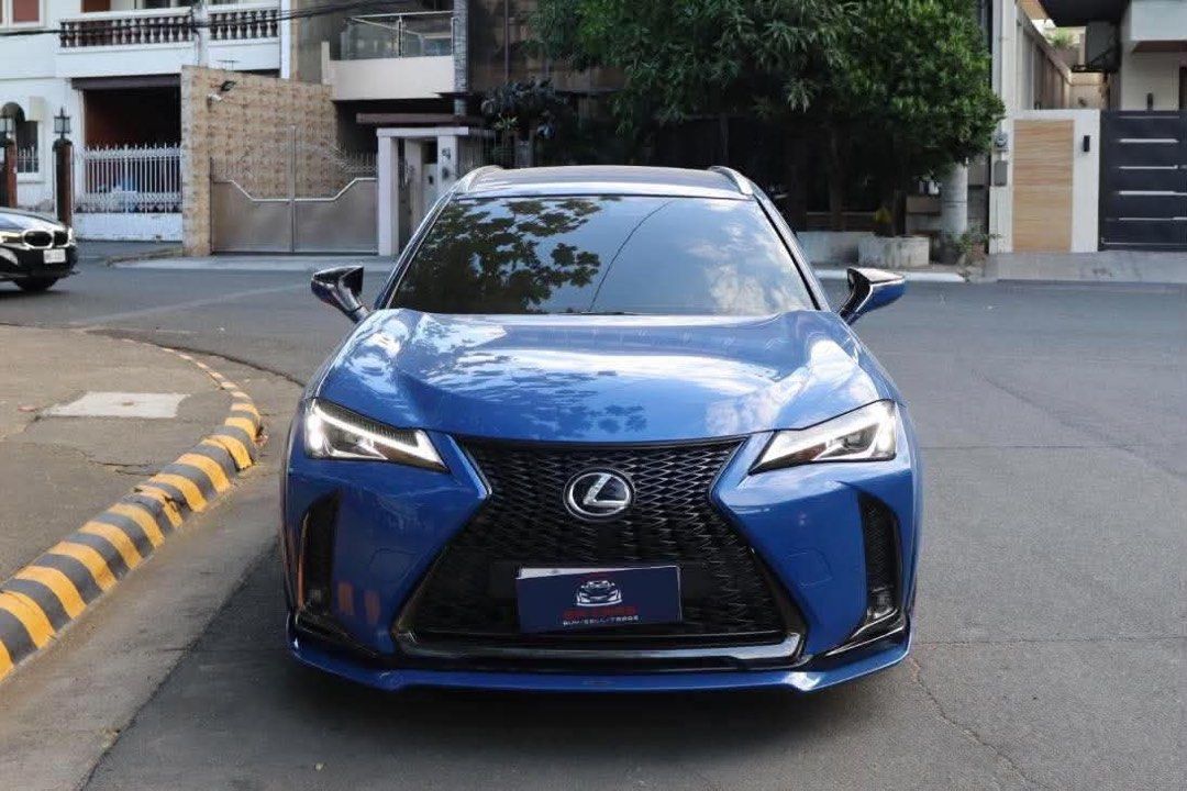 Lexus UX200 F Sport Auto (Category: Used Cars) located in Manila. Submitted by quality_cars (Listing ID 1464653065, Image 1). Description: 2019 Lexus UX200 F Sport 2.0-liter inline-4 engine (M20A-FKS) 30K Original Milage Very Rare Celestial Blue Color 5 Ending (Wednesday Coding) Registered 2027 First Owned Modifications worth 500K+ Built by Garageone Auto Performance Ceramic Pro PPF Gyeon Ceramic Coated Wireless Apple Carplay and Android Auto Bra