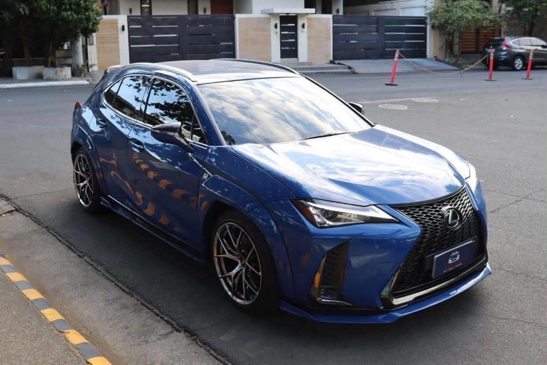 Lexus UX200 F Sport Auto (Category: Used Cars) located in Manila. Submitted by quality_cars (Listing ID 1464653065, Image 2). Description: 2019 Lexus UX200 F Sport 2.0-liter inline-4 engine (M20A-FKS) 30K Original Milage Very Rare Celestial Blue Color 5 Ending (Wednesday Coding) Registered 2027 First Owned Modifications worth 500K+ Built by Garageone Auto Performance Ceramic Pro PPF Gyeon Ceramic Coated Wireless Apple Carplay and Android Auto Bra