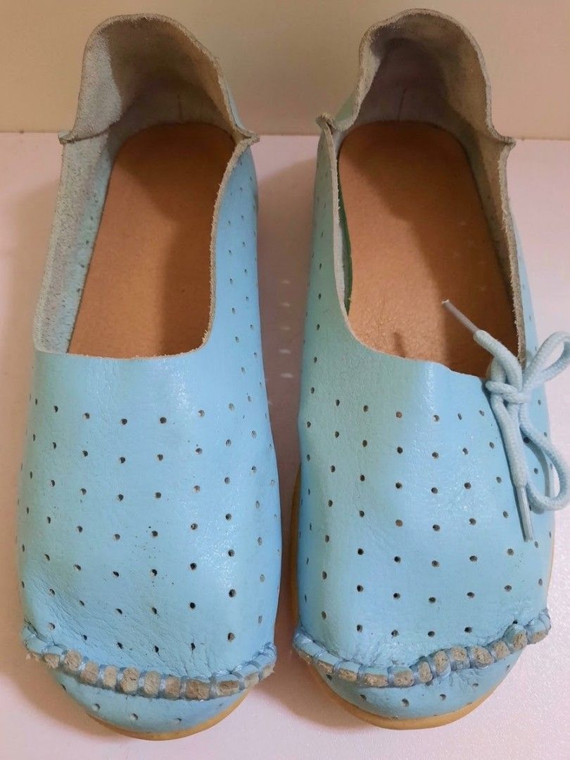 Light Blue Perforated Leather Slip-On Flat Shoes (Category: Flats & Sandals) located in Quezon City. Submitted by dannikkishoppe2 (Listing ID 1464574938, Image 2). Description: Light Blue Perforated Leather Slip-On Flats ‼️₱200‼️ • Made of soft leather with small perforations • Easy slip-on style • Decorative tie detail at the front • Ideal for casual wear size EU39 UK6 US8.