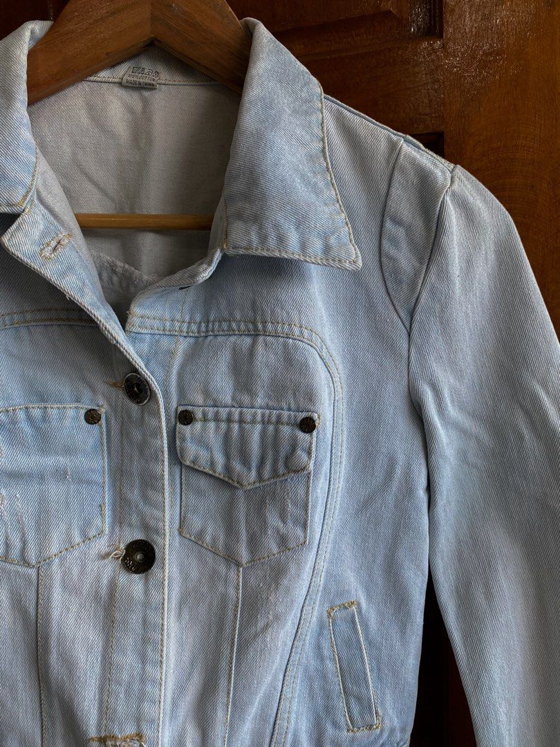 Light Wash Denim Jacket (Category: Coats, Jackets and Outerwear) located in Legazpi City. Submitted by engr.i (Listing ID 1464585062, Image 3). Description: - Fits S-M - Classic light wash denim jacket - Button-up front closure - Two chest pockets - Two side pockets - Standard shirt collar - Versatile for layering over tees or dresses.