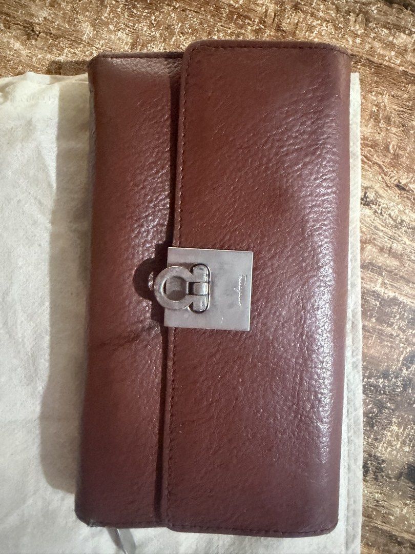Lightly used Salvatore Ferragamo (Category: Luxury Bags & Wallets) located in Sagay. Submitted by bingbinger80355 (Listing ID 1464665801, Image 1). Description: Salvatore Ferragamo wallet authentic lightly use.