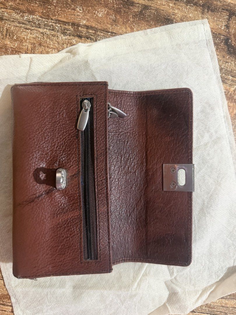 Lightly used Salvatore Ferragamo (Category: Luxury Bags & Wallets) located in Sagay. Submitted by bingbinger80355 (Listing ID 1464665801, Image 2). Description: Salvatore Ferragamo wallet authentic lightly use.