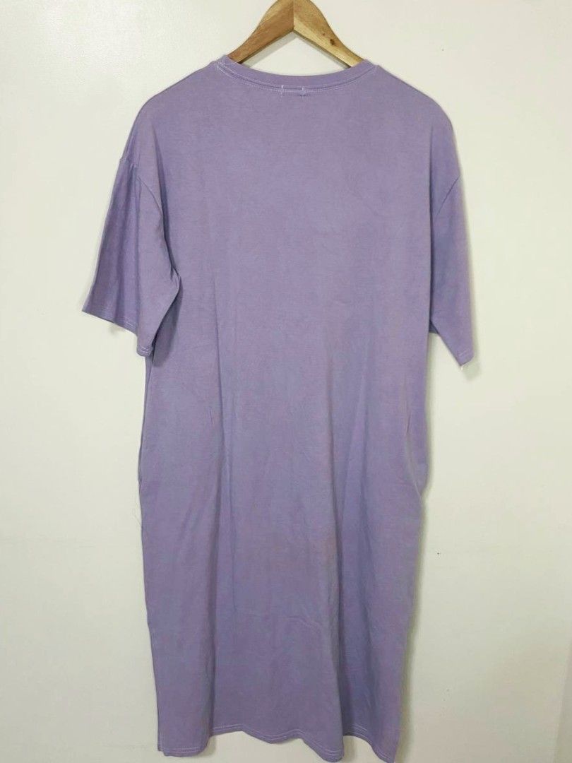 Lilac T-shirt Dress (Category: Dresses) located in Laoag. Submitted by __baptistakim (Listing ID 1464709370, Image 2). Description: Comfy lilac t-shirt dress, super relaxed fit. Great for casual days or lounging at home. Short sleeves, crew neckline, and a simple straight cut. Fabric feels soft and breathable. Fits up to a 44-inch bust, with a total length of 43 inches. Easy throw-on style..