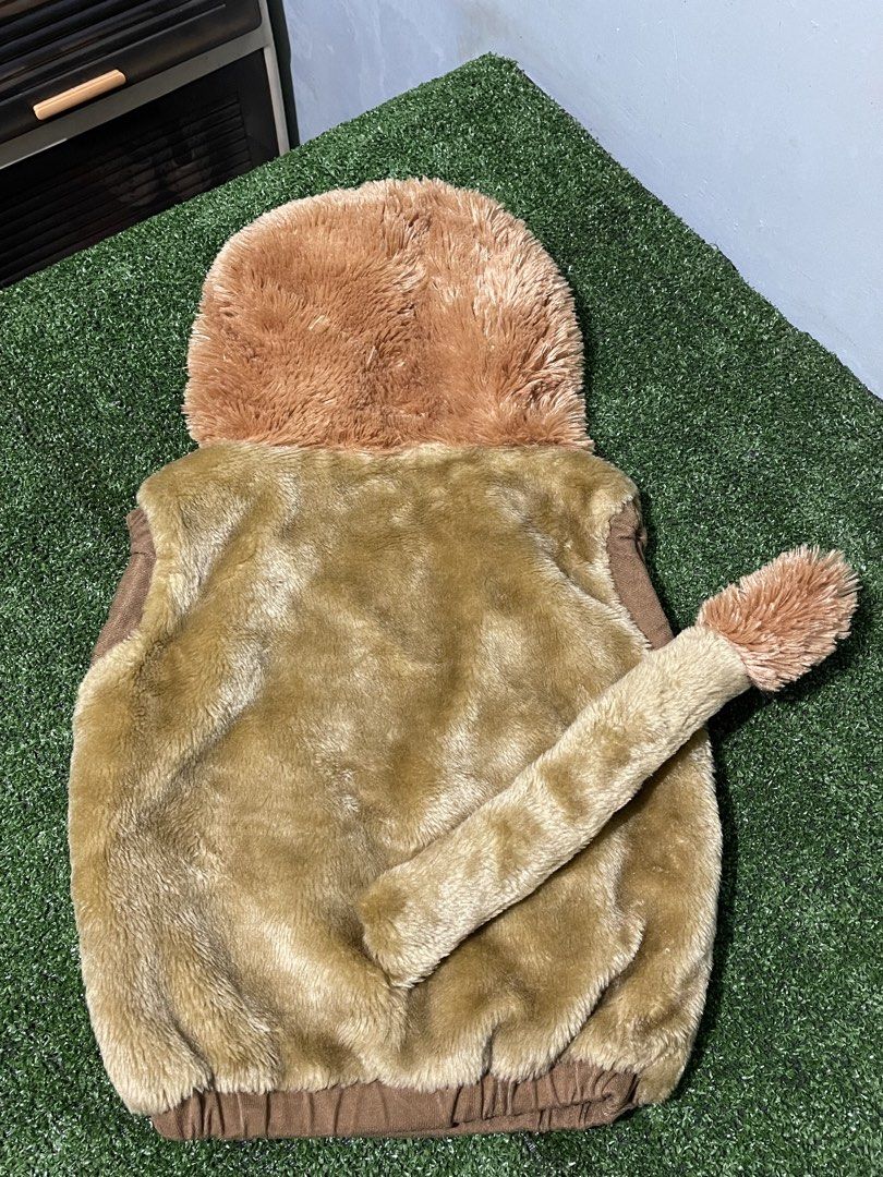 Lion Vest Costume (Category: Babies & Kids Fashion) located in Manila. Submitted by IMEG444 (Listing ID 1464601658, Image 3). Description: * VEST ONLY* Still in good condition Approx measurement when laid flat L 40cm W 40cm .