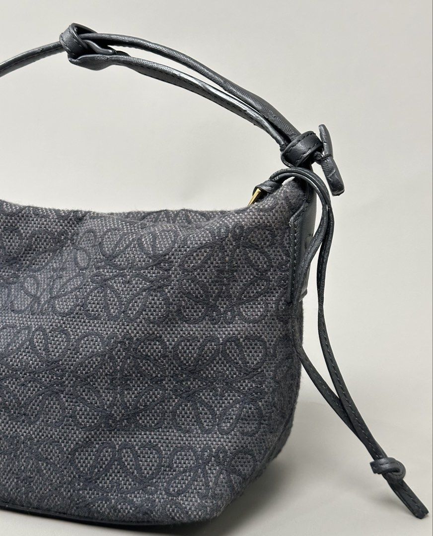 Loewe - Cubi Anagram Black Canvas - Leather Handle Bag (Category: Shoulder Bags) located in Manila. Submitted by scissor.2fifthy (Listing ID 1464647669, Image 3). Description: Loewe - Cubi Anagram Black Canvas - Leather Handle Bag Size: OS Made in Spain Material: Canvas / Leather Used condition Flaw: Sign of usage some press mark on leather handle Presentable Check all photos for more information Inclusion: Bag only and replacement dust bag Dimen
