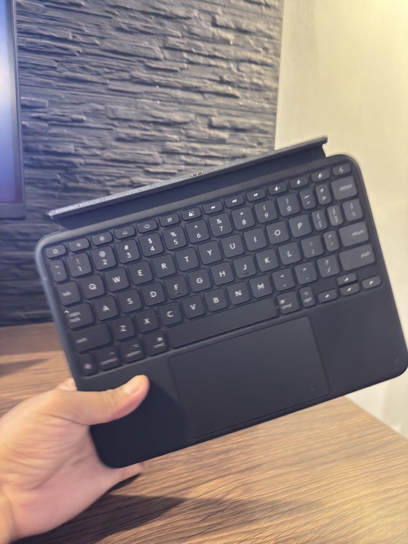 Logitech Combo Touch Keyboard Case for iPad (Category: Computer Keyboard) located in Taguig. Submitted by jhnlndllcndn (Listing ID 1464683068, Image 1). Description: - Logitech keyboard case for iPad Pro M4 - Built-in trackpad for easy navigation - Connects seamlessly via Smart Connector - Perfect for typing and productivity - Stickers on the back are removable.