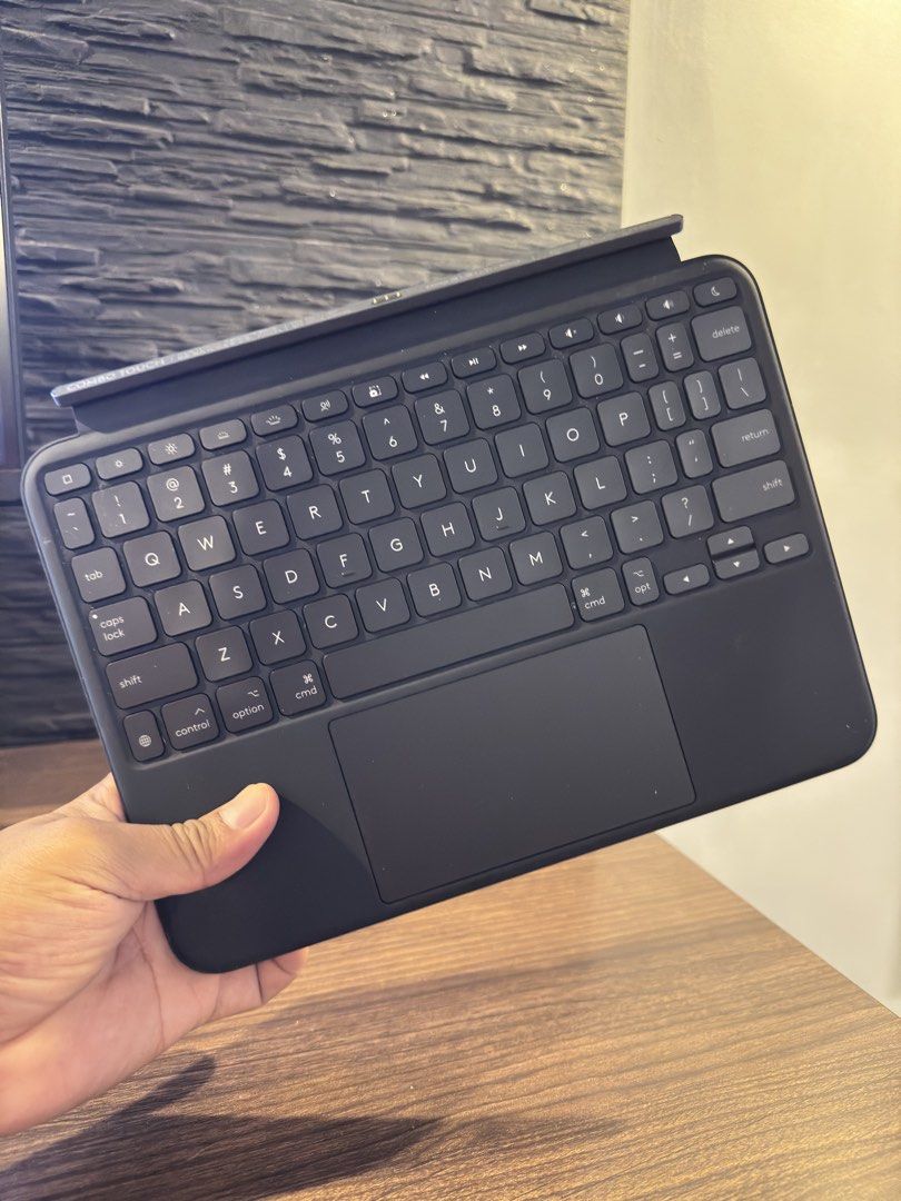 Logitech Combo Touch Keyboard Case for iPad (Category: Computer Keyboard) located in Taguig. Submitted by jhnlndllcndn (Listing ID 1464683068, Image 2). Description: - Logitech keyboard case for iPad Pro M4 - Built-in trackpad for easy navigation - Connects seamlessly via Smart Connector - Perfect for typing and productivity - Stickers on the back are removable.
