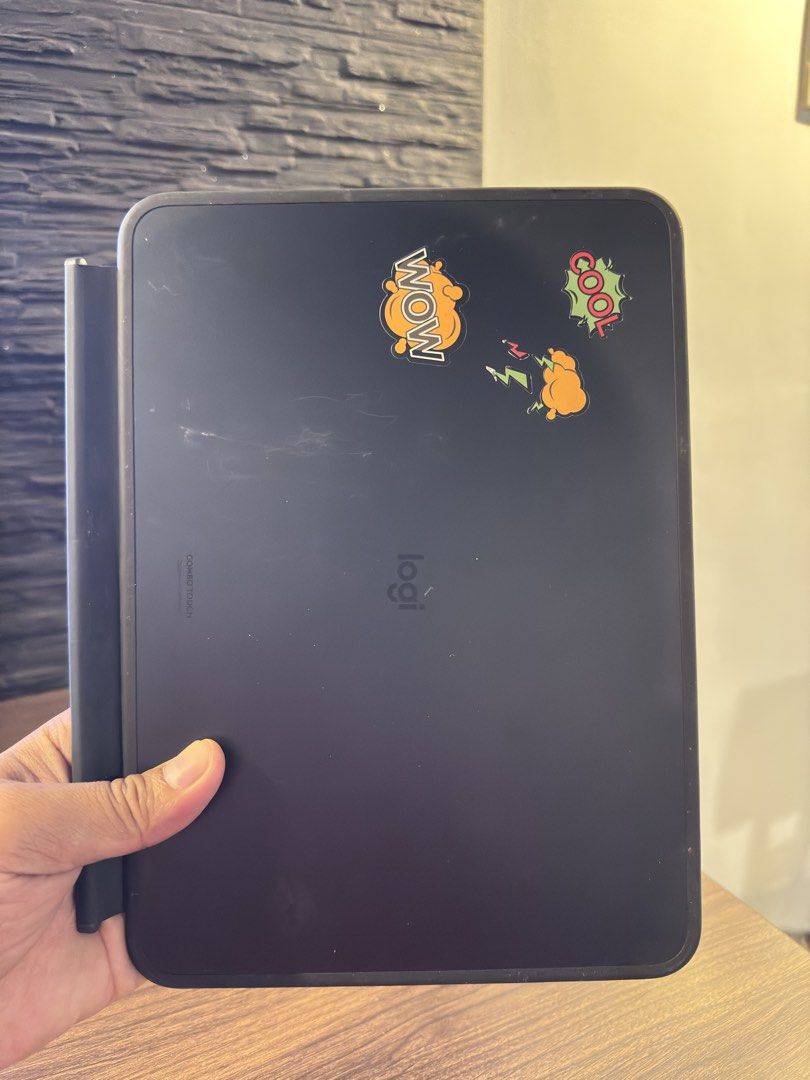 Logitech Combo Touch Keyboard Case for iPad (Category: Computer Keyboard) located in Taguig. Submitted by jhnlndllcndn (Listing ID 1464683068, Image 3). Description: - Logitech keyboard case for iPad Pro M4 - Built-in trackpad for easy navigation - Connects seamlessly via Smart Connector - Perfect for typing and productivity - Stickers on the back are removable.