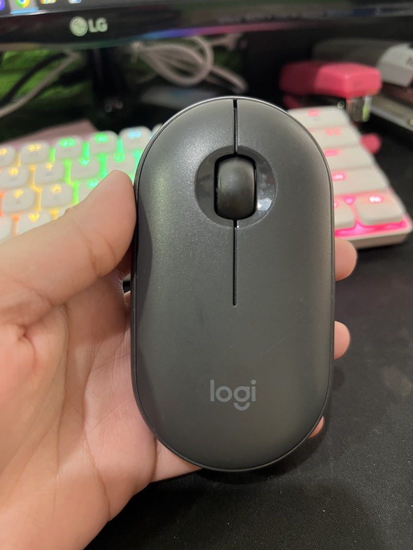 Logitech Pebble M350 Wireless Mouse - Graphite (Category: Mouse & Mousepads) located in Quezon City. Submitted by heythisismj (Listing ID 1464661401, Image 1). Description: - Logitech Pebble M350 Wireless Mouse - Color: Graphite - Compact and portable design - Excellent working condition - USB Dongle or Bluetooth connection - Selling because of setup upgrade - Still has plenty of battery life remaining with free 1 pc AA battery.