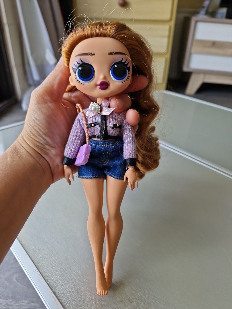 Lol surprise OMG Pose doll (Category: Kids Toys) located in Quezon City. Submitted by declttermum (Listing ID 1464578912, Image 2). Description: Preloved LOL surprise OMG Pose doll series 8. With bag. Very nice hair. No other issues. Wysiwyg. Available by December. #lolomgsurprisedoll #loldoll.