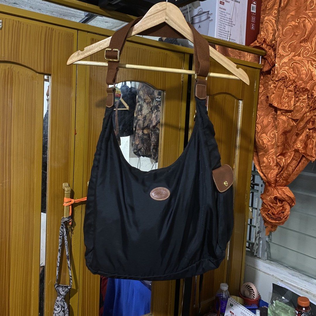 Long Champ Le Pliage Nylon Hobo Bag (Category: Cross-body Bags) located in Manila. Submitted by 4114thrifts.ph (Listing ID 1464751841, Image 1). Description: Item Name: Long Champ Le Pliage Nylon Hobo Bag (Details) • Condition: Very Good Condition • Color Rate: 9.4/10 • Issue/s: Super Minimal Sign of Usage Mine: 1,350 Free Shipping 📥 Dasmariñas City, Cavite, 4114📍.