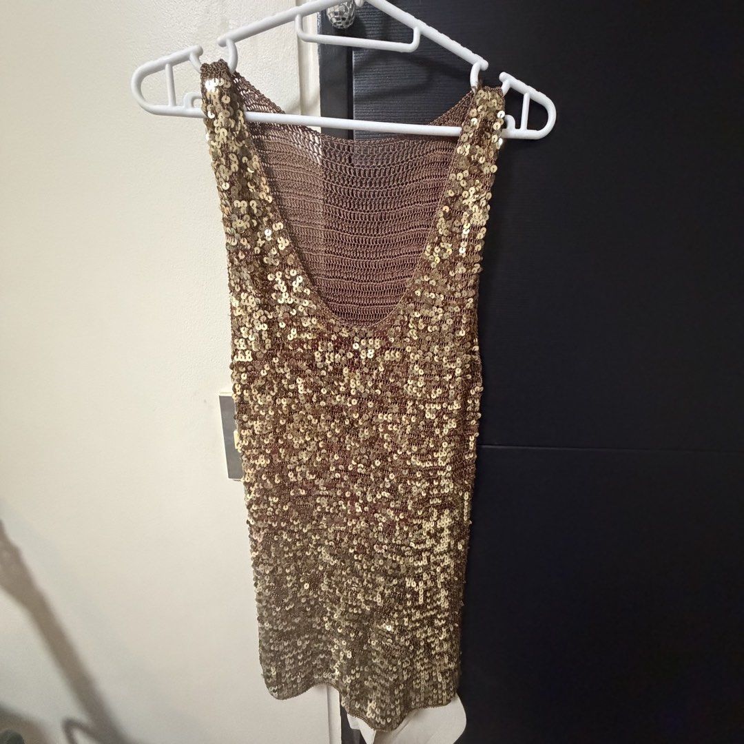 Long Blouse With Golden/Bronze Sequins (Category: Blouses) located in Manila. Submitted by varietycloset (Listing ID 1464745192, Image 1). Description: - not branded - perfect for going out! rfs: decluttering reminder: kindly manage your expectations as this is a pre-loved item 🤍 strictly no returns and refunds mop: gcash/bank transfer we ship within metro manila ONLY -buyer will book & shoulder the delivery.