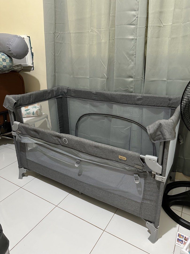 Looping All in one pack and play (Category: Cots & Cribs) located in Manila. Submitted by whatwewore18 (Listing ID 1464764497, Image 1). Description: - Brand: Looping - Color: Elegant Grey -Used for like 3 mos only - Function: Baby cot and playpen in one -Co-sleep - Safety & Comfort: Breathable mesh sides for great airflow and easy monitoring - Frame: Sturdy and durable metal internal frame - Portability: Includes a matching grey storage bag with