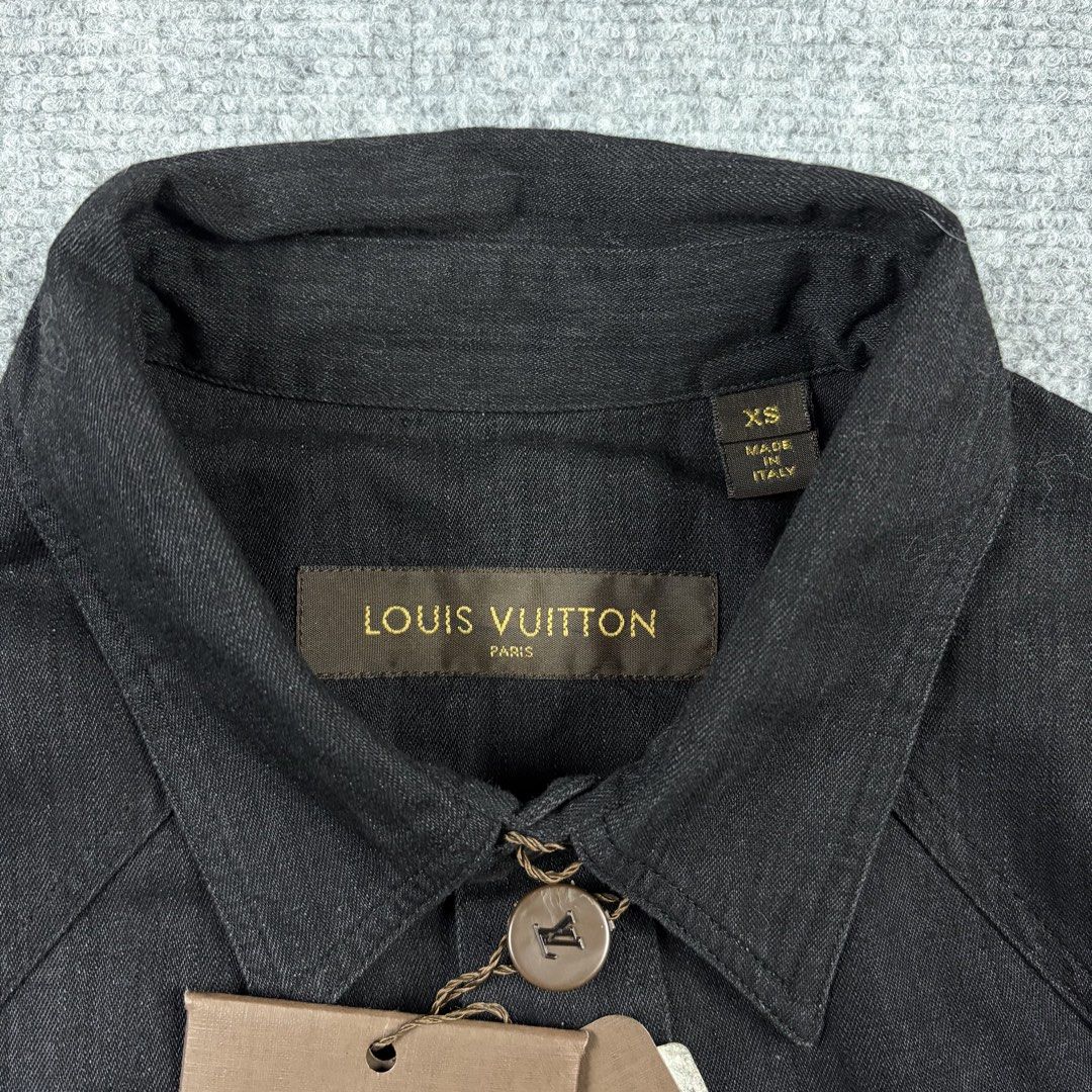 Louis Vuitton Button Up Denim Shirt (Category: Luxury Apparel) located in Manila. Submitted by yourtherapist_ (Listing ID 1464709032, Image 3). Description: Louis Vuitton Button Up Denim Shirt Size: XS Condition: NWT Material: 100% Cotton Made in: Italy Measurements Width: 20 Length: 29F/31B Shoulder: 17 Sleeve: 26 25,000.