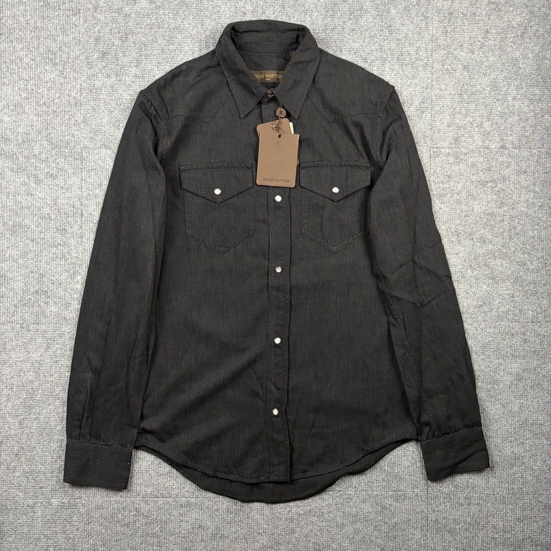 Louis Vuitton Button Up Denim Shirt (Category: Luxury Apparel) located in Manila. Submitted by yourtherapist_ (Listing ID 1464709032, Image 1). Description: Louis Vuitton Button Up Denim Shirt Size: XS Condition: NWT Material: 100% Cotton Made in: Italy Measurements Width: 20 Length: 29F/31B Shoulder: 17 Sleeve: 26 25,000.