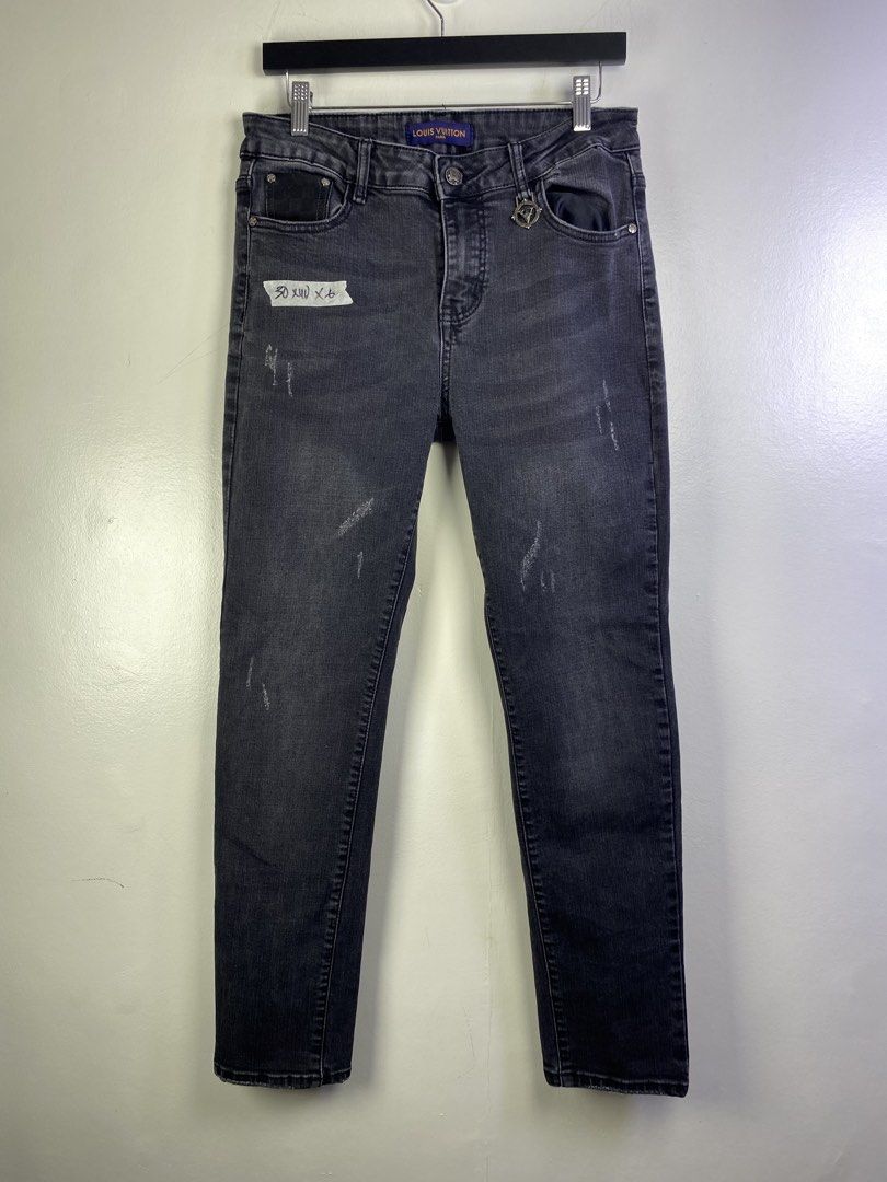 Louis Vuitton Grey Distressed Denim Jeans (Category: Jeans) located in Manila. Submitted by declutterpromax (Listing ID 1464601142, Image 1). Description: - Louis Vuitton Grey Denim Jeans - Distressed design with rips and fading - Unique LV charm detail on pocket - Slim fit for a modern silhouette - Ideal for stylish casual wear.
