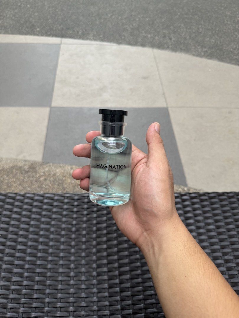 Louis Vuitton Imagination Fragrance (Category: Fragrance & Deodorants) located in Manila. Submitted by ethan.sycayco24 (Listing ID 1464713655, Image 1). Description: - Authentic Louis Vuitton Imagination fragrance - Fill level: Roughly 85-90% remaining - Design: Clear glass bottle with pale blue juice and black cap featuring the gold LV monogram - Details: Imprinted front label and molded glass on the bottom - Perfect opportunity to try this popu