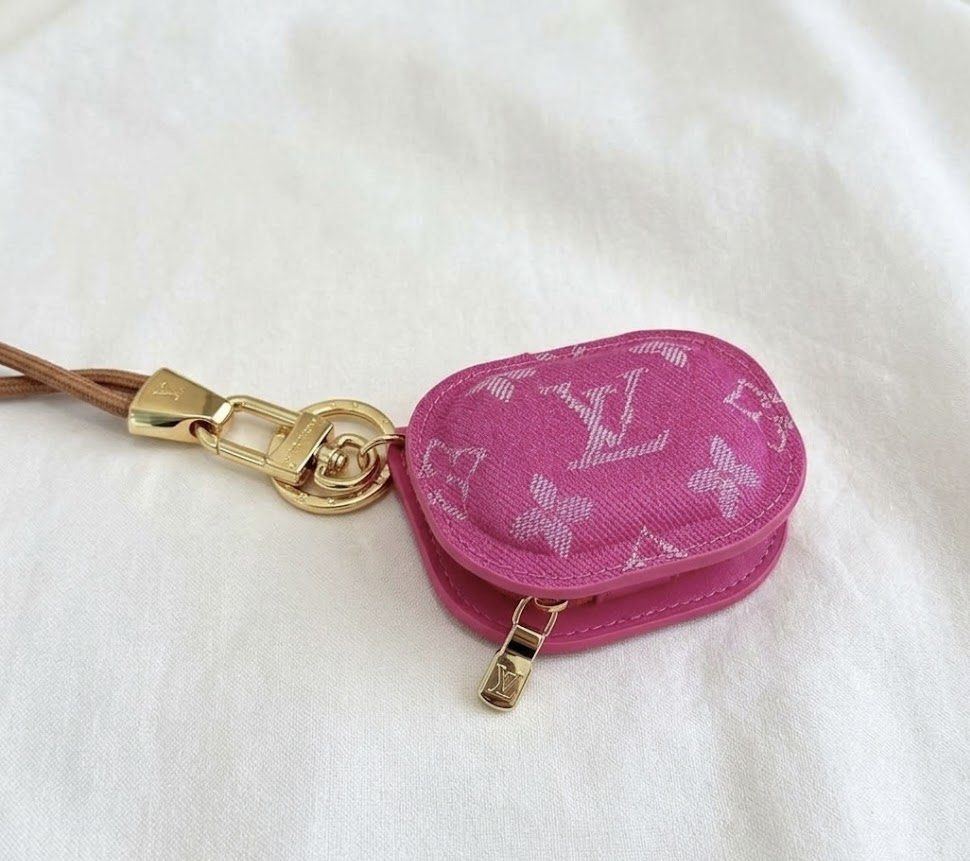 Louis Vuitton Monogram Denim & Leather Airpods Case (Category: Luxury Bags & Wallets) located in Mabalacat. Submitted by davidbianc04942 (Listing ID 1464597128, Image 2). Description: - Iconic LV monogram pattern - Available in denim blue, hot pink, and light pink leather - Features a gold clasp and lanyard - Keeps your Airpods safe and stylish.