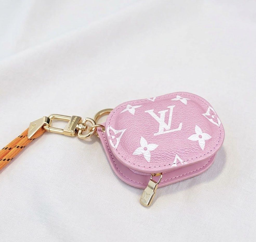 Louis Vuitton Monogram Denim & Leather Airpods Case (Category: Luxury Bags & Wallets) located in Mabalacat. Submitted by davidbianc04942 (Listing ID 1464597128, Image 3). Description: - Iconic LV monogram pattern - Available in denim blue, hot pink, and light pink leather - Features a gold clasp and lanyard - Keeps your Airpods safe and stylish.