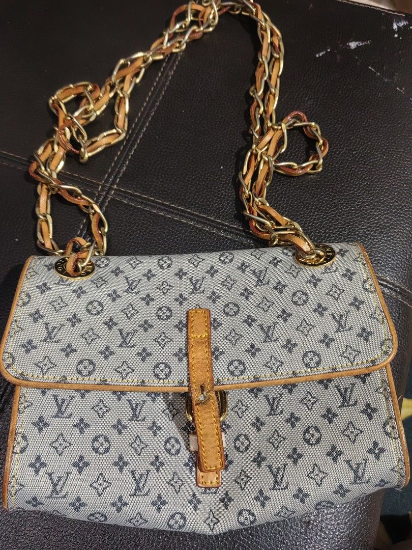 Louis Vuitton Monogram Denim Shoulder Bag (Category: Luxury Bags & Wallets) located in San Pedro. Submitted by charlie0603 (Listing ID 1464669017, Image 1). Description: - Classic Louis Vuitton shoulder bag - Iconic monogram pattern on denim - Leather trim and gold chain strap - Secure buckle closure with leather strap - Versatile for everyday or evening use - Note: Shows some signs of wear on the leather strap and chain.