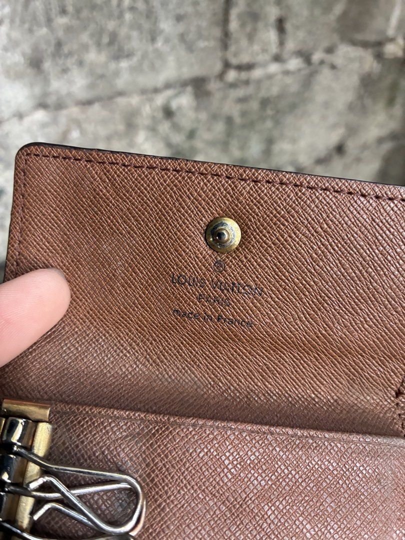 Louis Vuitton Monogram Graffiti Key Holder (Category: Luxury Bags & Wallets) located in Manila. Submitted by assortedgoodsv3 (Listing ID 1464764724, Image 3). Description: - Authentic Louis Vuitton key holder - Iconic brown monogram canvas with Stephen Sprouse white graffiti print - Features 6 interior key hooks with gold-tone hardware and snap button closure - Made in France - Condition: Exterior canvas and original paint are intact; interior sh